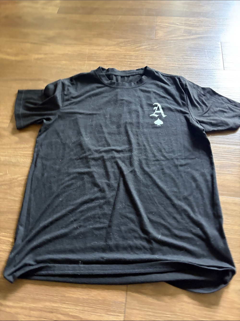 Black Men's Graphic Tee with 'A' Emblem
